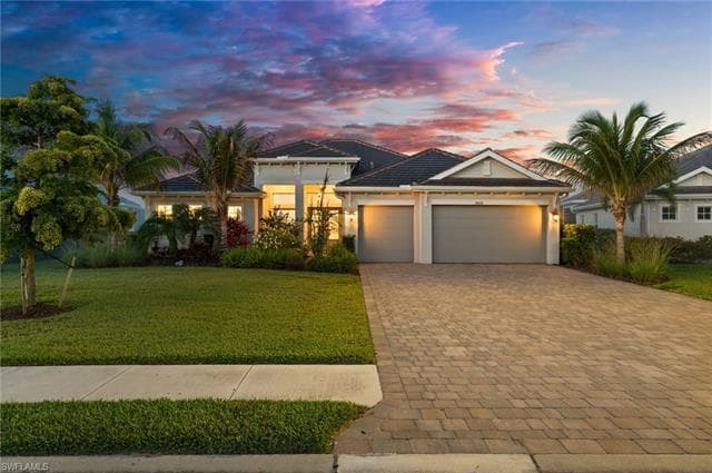 Front exterior of 18420 WildBlue Boulevard at sunset