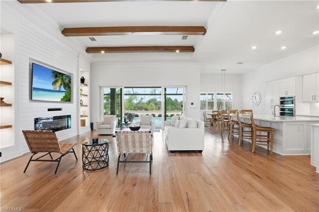 Living room opening toward the kitchen and lanai
