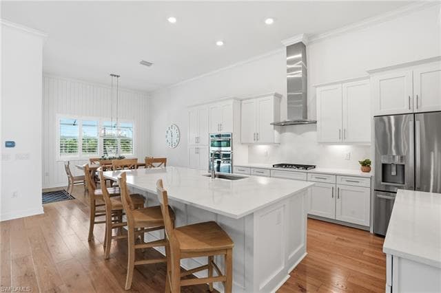 White kitchen with large island